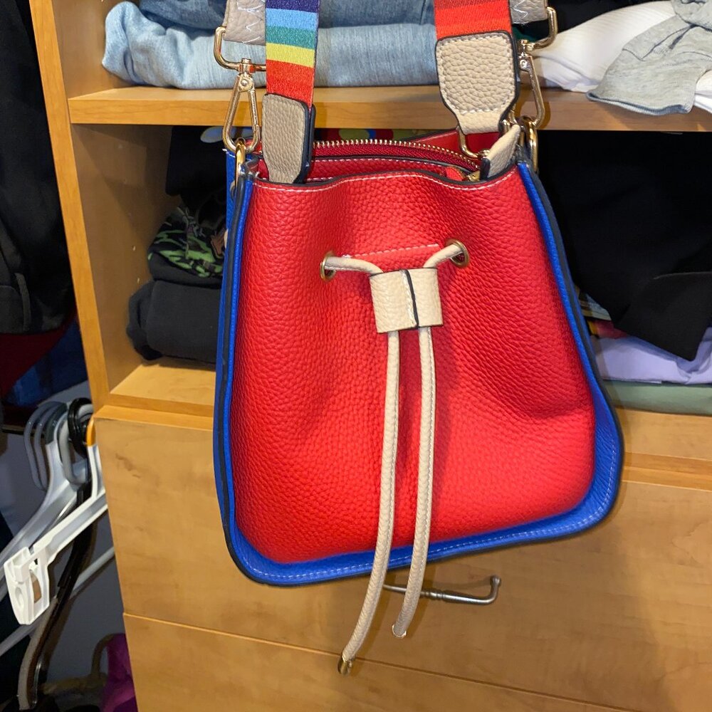 Red Pebbled Leather Bucket Crossbody with Blue Trim and Cream Drawstring